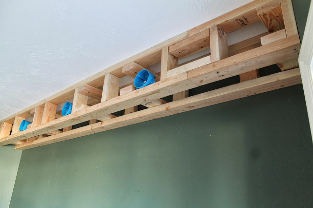 DIY Solid Wood Wall-to-Wall Shelves - Chris Loves Julia