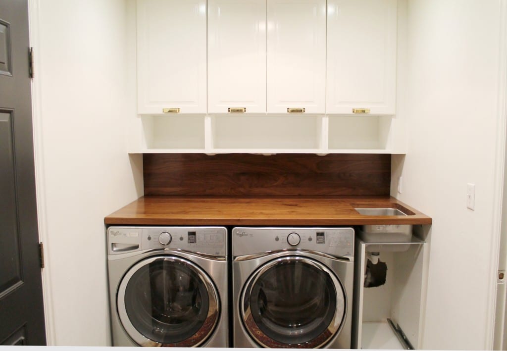 A Walnut Counter And Backsplash In The, How To Replace Laundry Room Cabinets