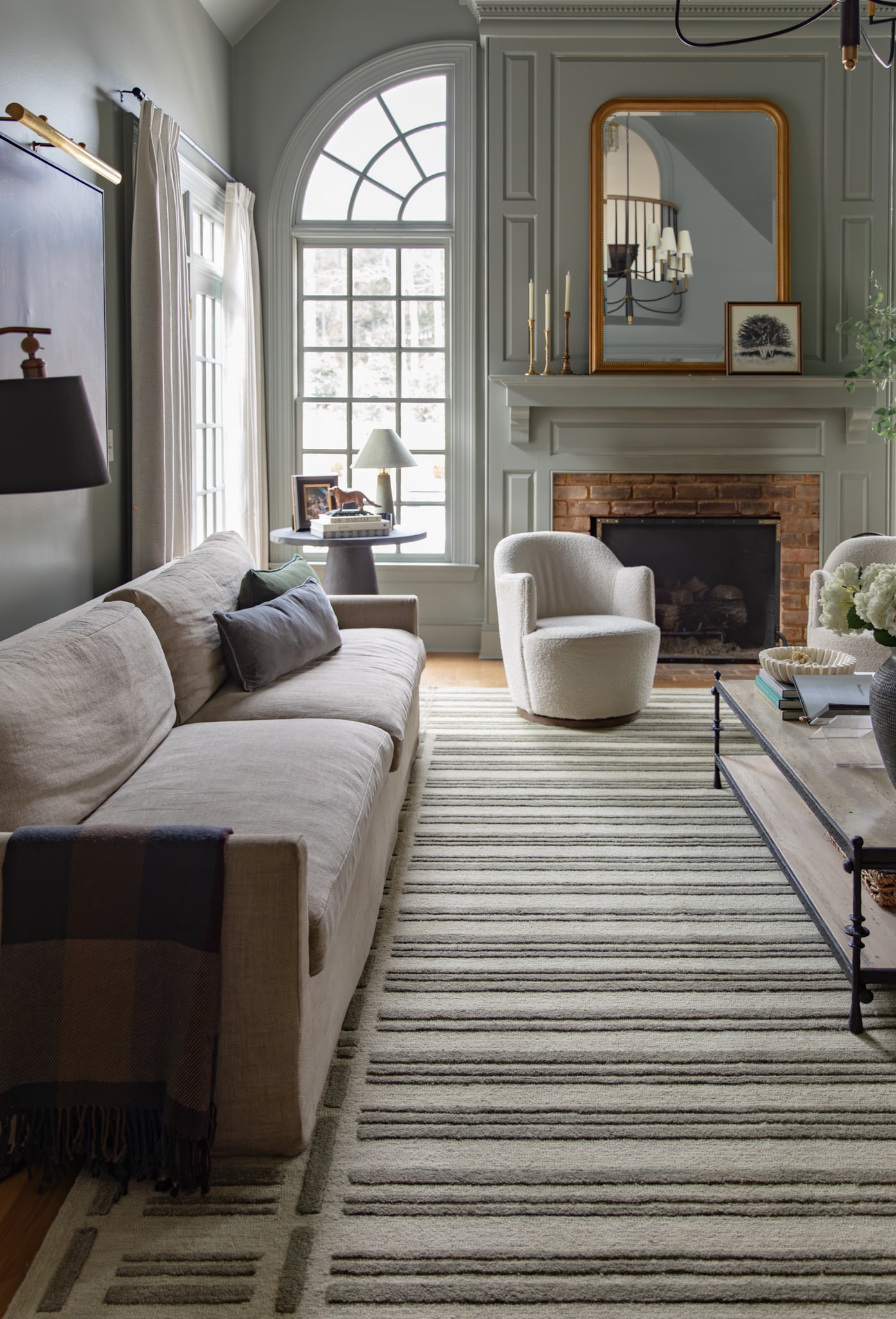 Chris Loves Julia | Living room with couch and one blanket