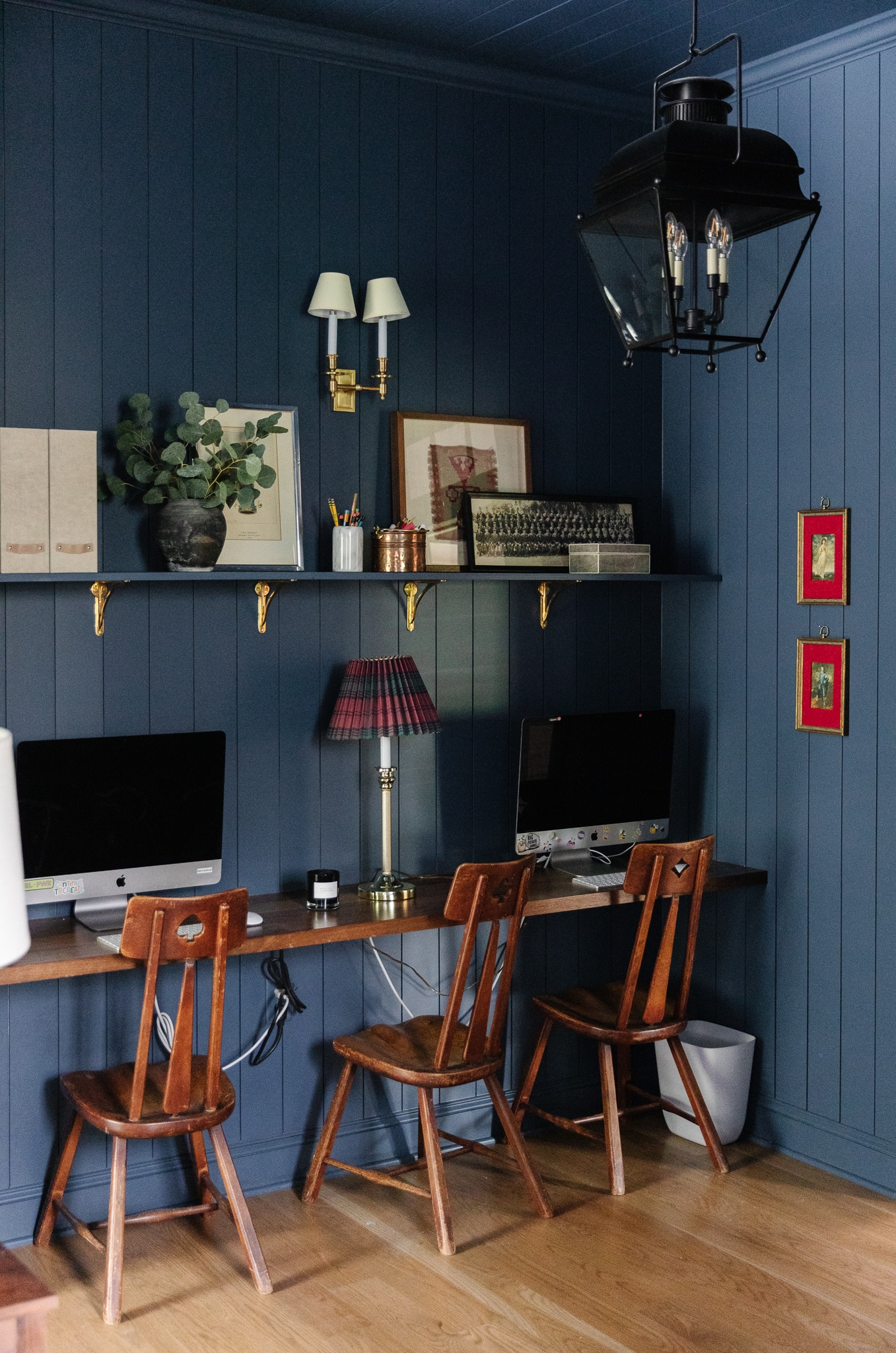 Chris Loves Julia | Bonus room with navy shiplap, wood desk with monitors and three vintage wood chairs