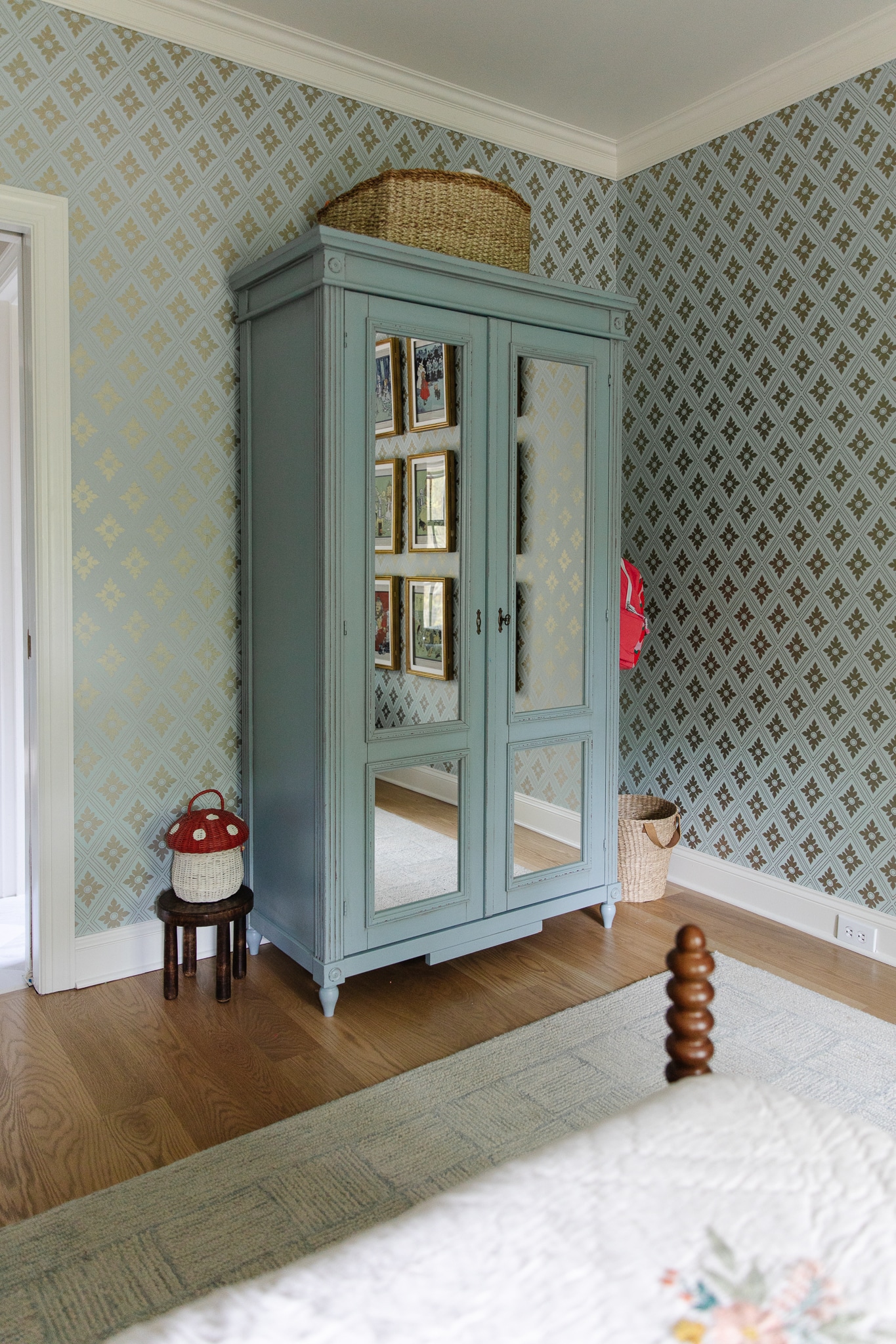 Chris Loves Julia | Faye's bedroom with teal blue wallpaper and teal wardrobe with mirrored front