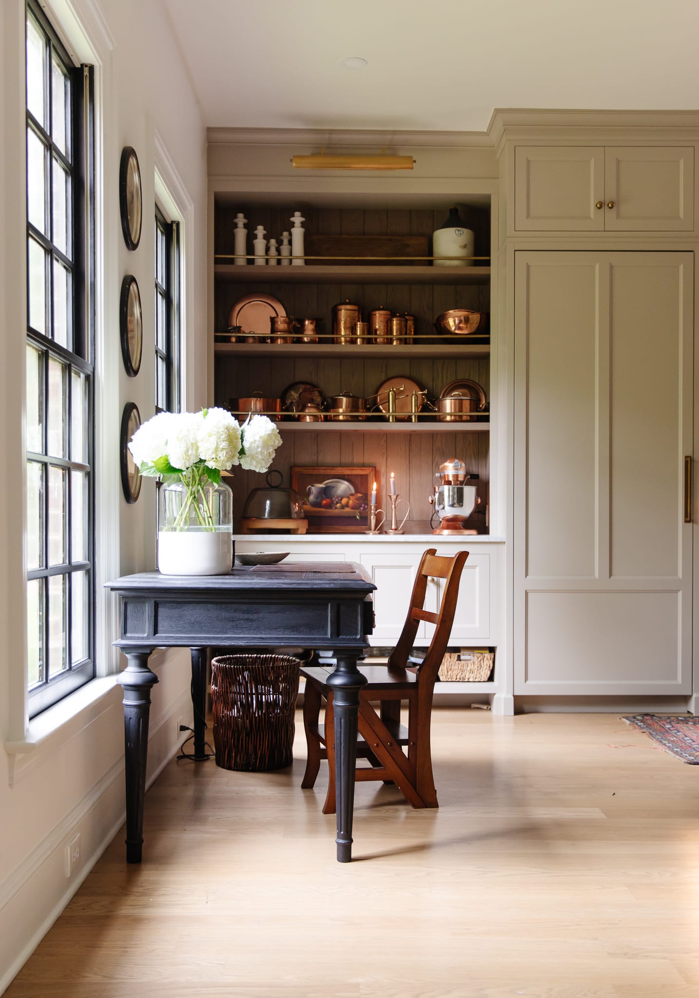 Chris Loves Julia | Kitchen with navy desk and copper pots