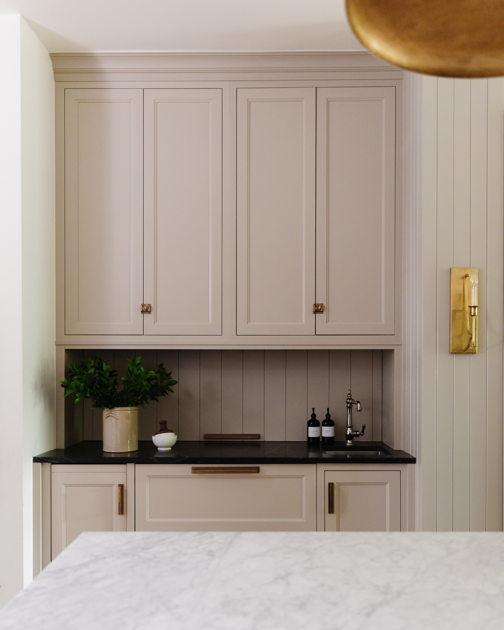 Chris Loves Julia | Kitchen cabinets in Bromley taupe bar with sink